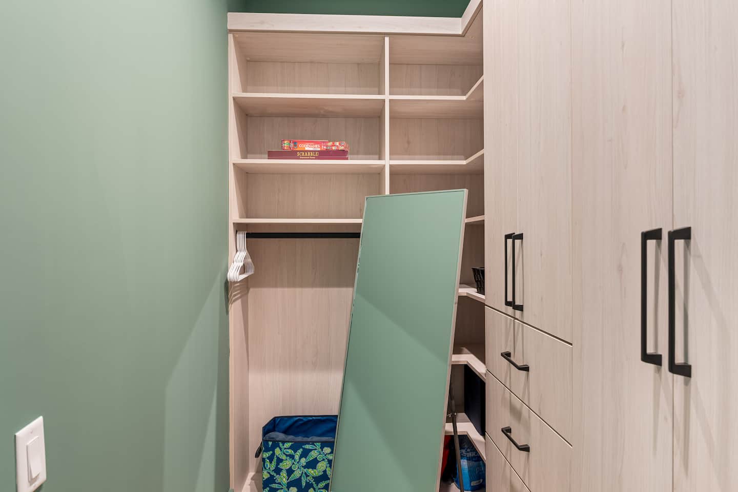 Custom walk-in closet with built-in cabinetry